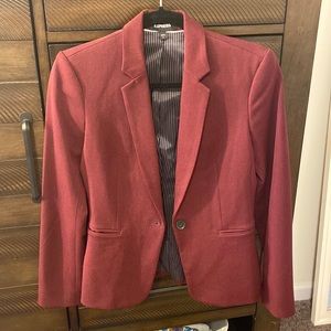 Maroon blazer with black accents.